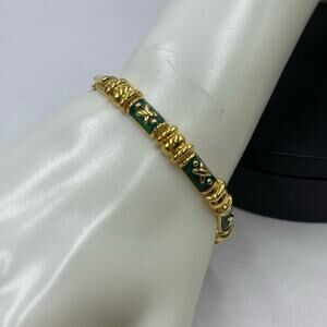 Joan Rivers Signed Vintage Gold Tone and Green Enamel Bracelet Snap Closure‎
